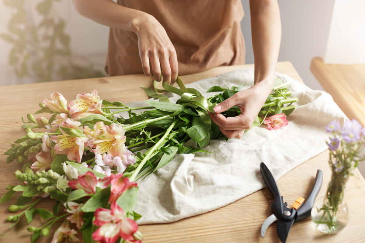 woman making bouquet
